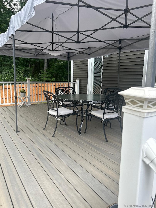 330 Dogburn Ln, Orange, CT 06477 - wooden deck featuring outdoor dining space