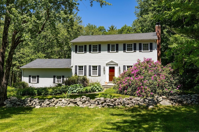 318 Milton Rd, Litchfield, CT 06759 - colonial inspired home featuring a chimney and a front lawn