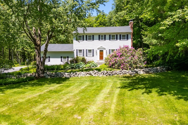 318 Milton Rd, Litchfield, CT 06759 - colonial-style house with a chimney and a front yard