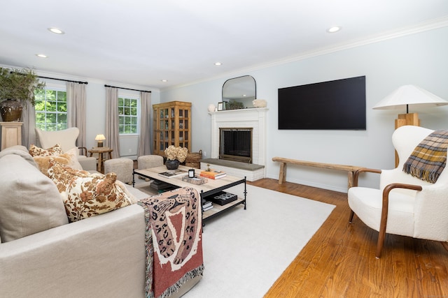 318 Milton Rd, Litchfield, CT 06759 - living room with wood finished floors, ornamental molding, a brick fireplace, and recessed lighting
