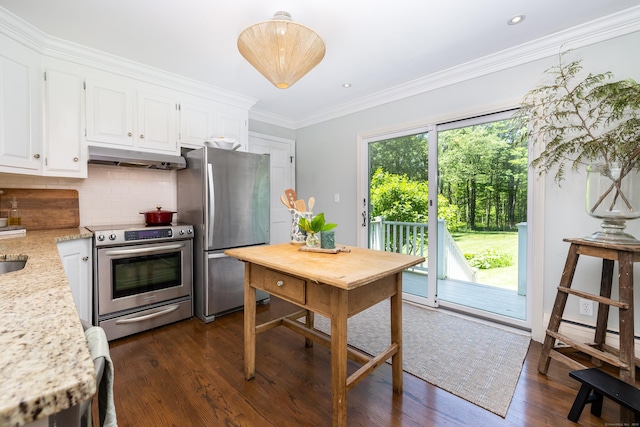 318 Milton Rd, Litchfield, CT 06759 - kitchen featuring appliances with stainless steel finishes, plenty of natural light, white cabinets, and ornamental molding