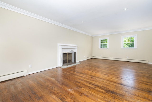 318 Milton Rd, Litchfield, CT 06759 - unfurnished living room featuring a baseboard heating unit, crown molding, a fireplace with raised hearth, wood finished floors, and recessed lighting