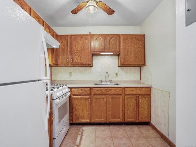 2600 Park Ave Unit 6H, Bridgeport, CT 06604 - kitchen featuring white appliances, a ceiling fan, light countertops, and brown cabinets