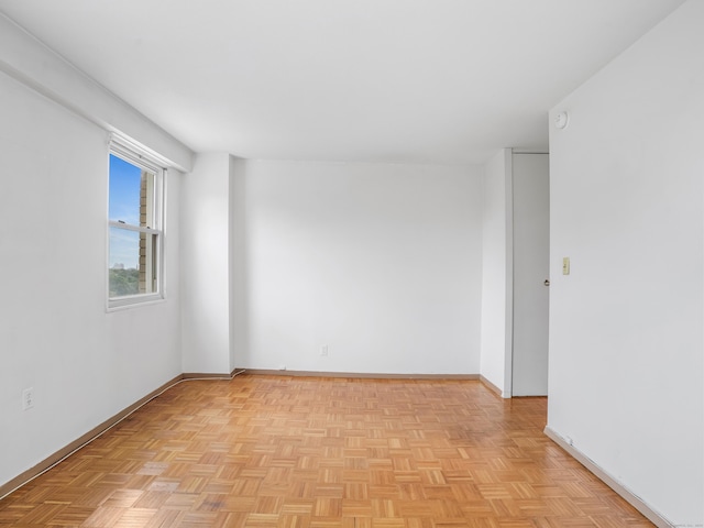 2600 Park Ave Unit 6H, Bridgeport, CT 06604 - spare room with baseboards and a smoke detector