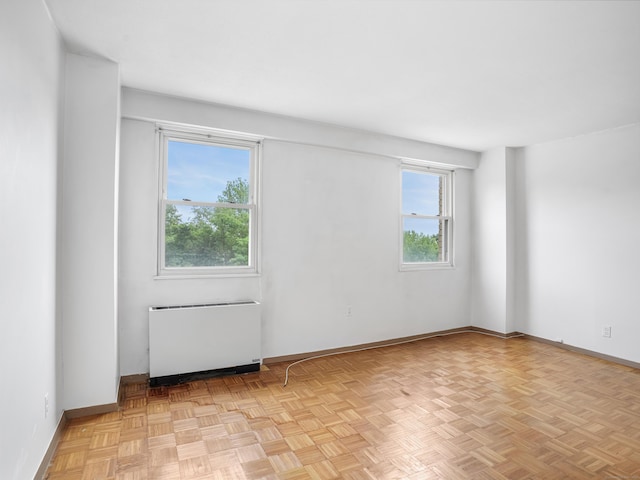 2600 Park Ave Unit 6H, Bridgeport, CT 06604 - empty room featuring radiator and baseboards
