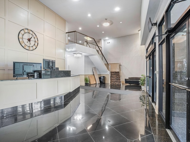 2600 Park Ave Unit 6H, Bridgeport, CT 06604 - welcome area featuring recessed lighting, a towering ceiling, and stairway