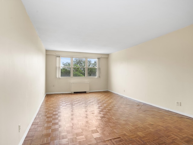 2600 Park Ave Unit 6H, Bridgeport, CT 06604 - empty room featuring radiator and baseboards