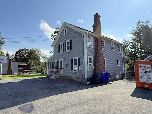 293 Torringford W St, Torrington, CT 06790 - view of front of property with a chimney