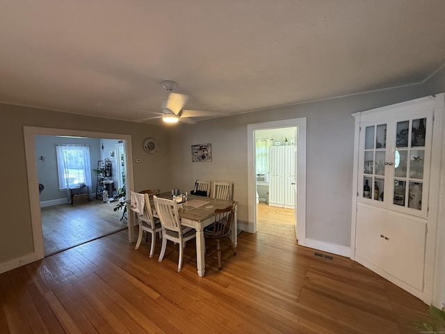 293 Torringford W St, Torrington, CT 06790 - dining space featuring wood-type flooring and a ceiling fan
