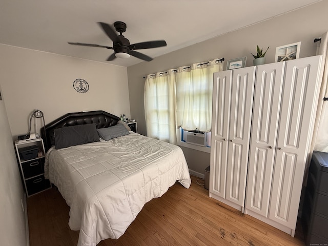 293 Torringford W St, Torrington, CT 06790 - bedroom featuring cooling unit, light wood-type flooring, and a ceiling fan