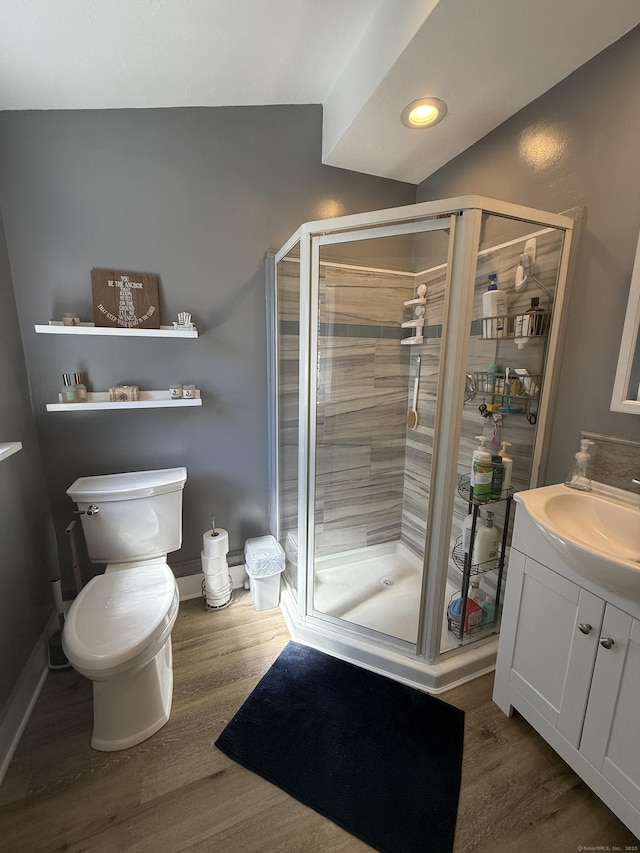 293 Torringford W St, Torrington, CT 06790 - bathroom with wood finished floors, vanity, a stall shower, and recessed lighting