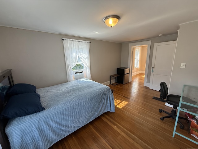 293 Torringford W St, Torrington, CT 06790 - bedroom with wood finished floors and cooling unit