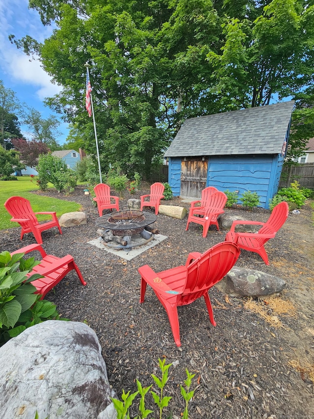 293 Torringford W St, Torrington, CT 06790 - view of yard featuring an outdoor fire pit and a storage shed