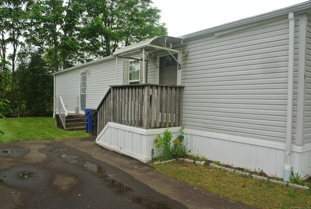 8 Barn Ln, Milford, CT 06460 - view of home's exterior with a wooden deck