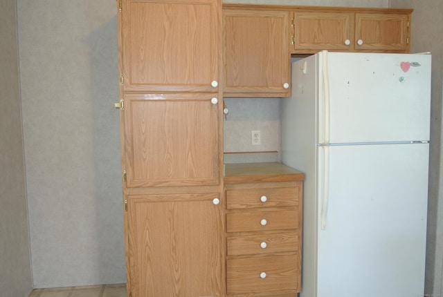 8 Barn Ln, Milford, CT 06460 - kitchen with freestanding refrigerator and light countertops