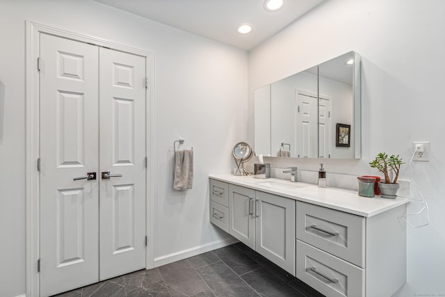 132 Deerwood Rd, Tolland, CT 06084 - bathroom with vanity, marble finish floors, and recessed lighting