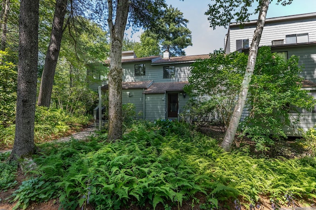 109 Old Farms Rd Unit 109, Torrington, CT 06790 - back of house featuring a chimney