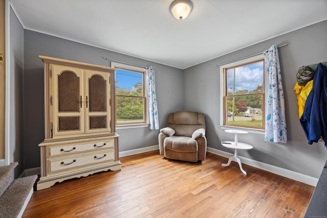 170 Celia Dr, Waterbury, CT 06705 - living area featuring light wood-style flooring and stairway