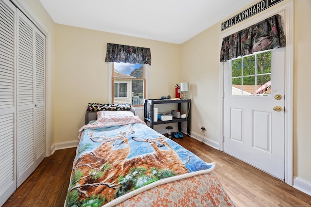 170 Celia Dr, Waterbury, CT 06705 - bedroom with multiple windows, wood finished floors, and a closet