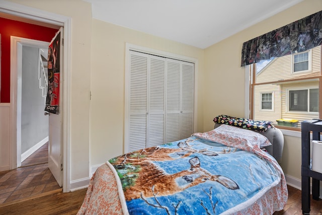170 Celia Dr, Waterbury, CT 06705 - bedroom with a closet and wood finished floors