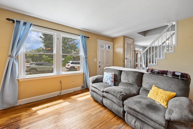 170 Celia Dr, Waterbury, CT 06705 - living area featuring wood-type flooring and stairs