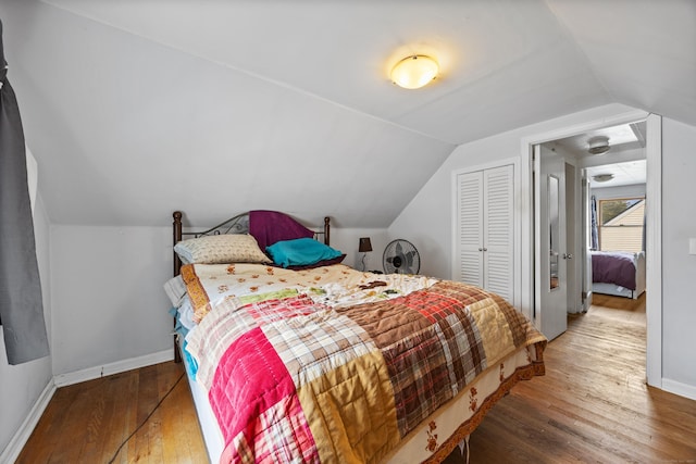 170 Celia Dr, Waterbury, CT 06705 - bedroom featuring hardwood / wood-style flooring, lofted ceiling, and a closet