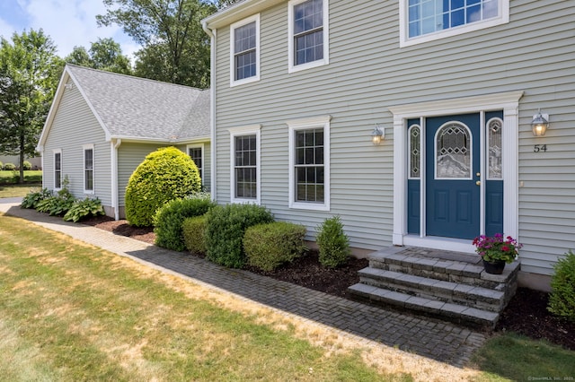 54 Round Hill Rd, Manchester, CT 06040 - property entrance with a shingled roof