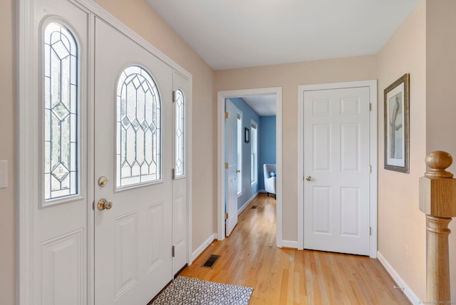 54 Round Hill Rd, Manchester, CT 06040 - foyer with healthy amount of natural light and light wood-style floors