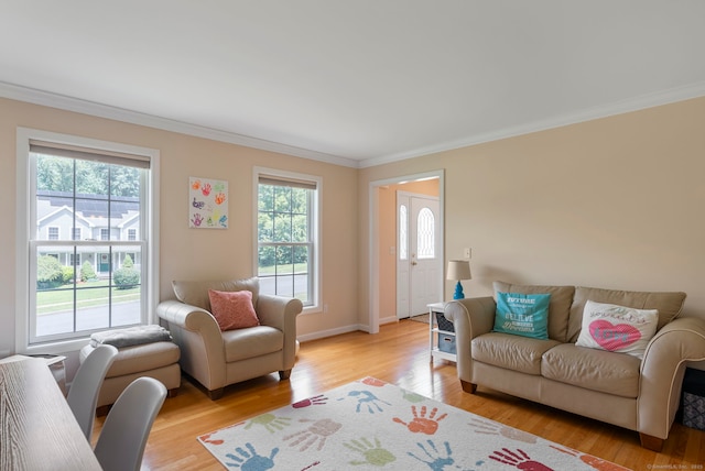 54 Round Hill Rd, Manchester, CT 06040 - living area with plenty of natural light, ornamental molding, and light wood-style floors