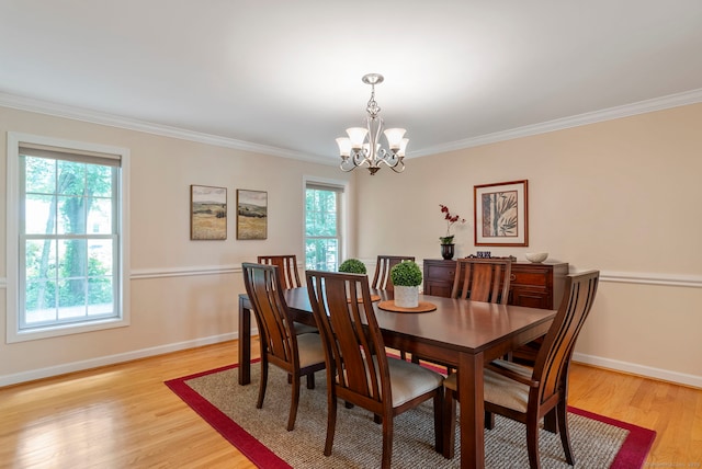 54 Round Hill Rd, Manchester, CT 06040 - dining room with a chandelier, light wood-style floors, and ornamental molding