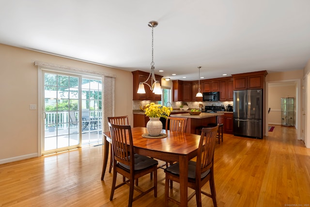 54 Round Hill Rd, Manchester, CT 06040 - dining room featuring light wood-style floors and recessed lighting