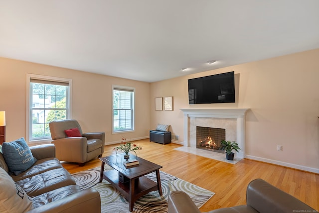 54 Round Hill Rd, Manchester, CT 06040 - living room with wood finished floors and a tiled fireplace