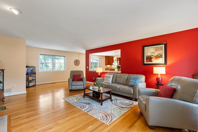 54 Round Hill Rd, Manchester, CT 06040 - living area featuring wood finished floors and baseboards