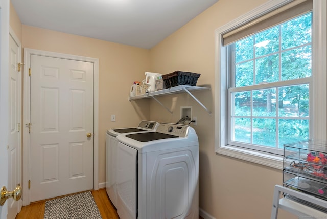 54 Round Hill Rd, Manchester, CT 06040 - laundry room with washing machine and clothes dryer and light wood finished floors