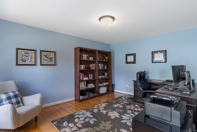 54 Round Hill Rd, Manchester, CT 06040 - home office featuring wood finished floors and baseboards