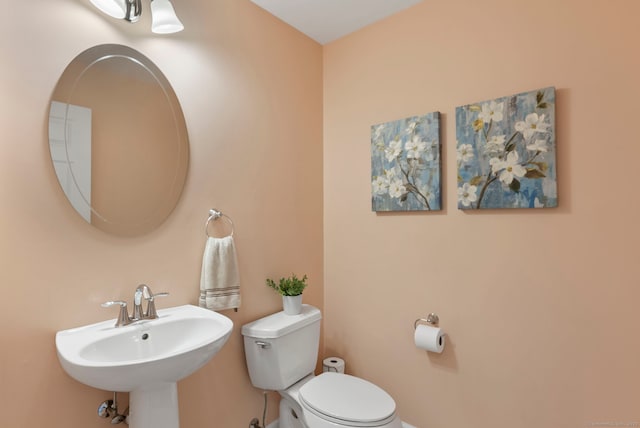 54 Round Hill Rd, Manchester, CT 06040 - bathroom featuring toilet and a sink