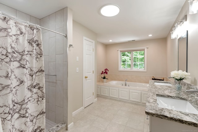 54 Round Hill Rd, Manchester, CT 06040 - bathroom with double vanity, a tile shower, a garden tub, recessed lighting, and tile patterned floors