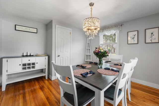 10 Harding Ave, Newington, CT 06111 - dining room with a chandelier and wood finished floors