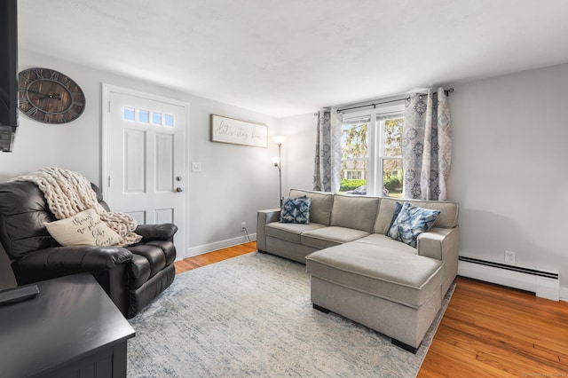 10 Harding Ave, Newington, CT 06111 - living room featuring baseboard heating and wood finished floors