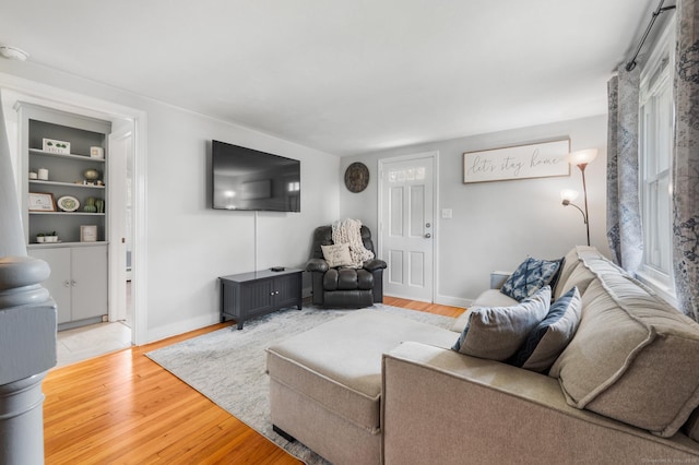 10 Harding Ave, Newington, CT 06111 - living room featuring plenty of natural light, light wood-style floors, and built in features