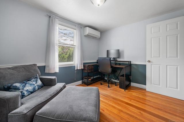 10 Harding Ave, Newington, CT 06111 - office area with a wall unit AC and light wood-type flooring