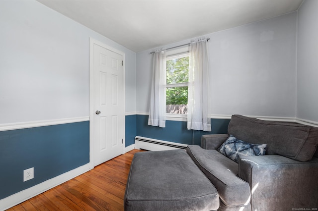 10 Harding Ave, Newington, CT 06111 - sitting room with a baseboard radiator and wood finished floors
