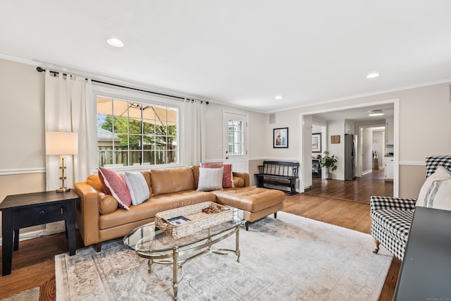 66 Concord St, West Hartford, CT 06119 - living room featuring wood finished floors, crown molding, and recessed lighting