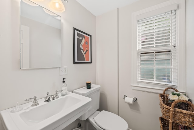 66 Concord St, West Hartford, CT 06119 - half bathroom with a sink and toilet