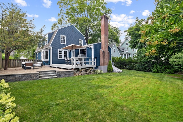 66 Concord St, West Hartford, CT 06119 - rear view of property with a deck, a gambrel roof, outdoor lounge area, and a chimney