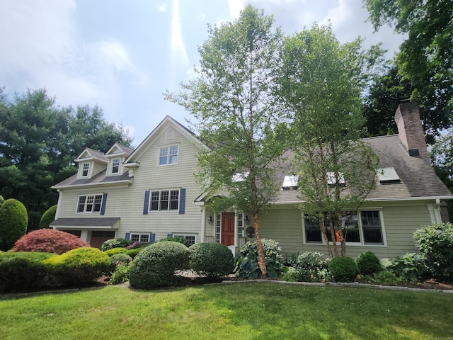 8 Caddy Rd, Norwalk, CT 06851 - view of front facade featuring a front yard and a chimney