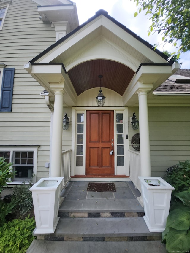 8 Caddy Rd, Norwalk, CT 06851 - entrance to property featuring roof with shingles