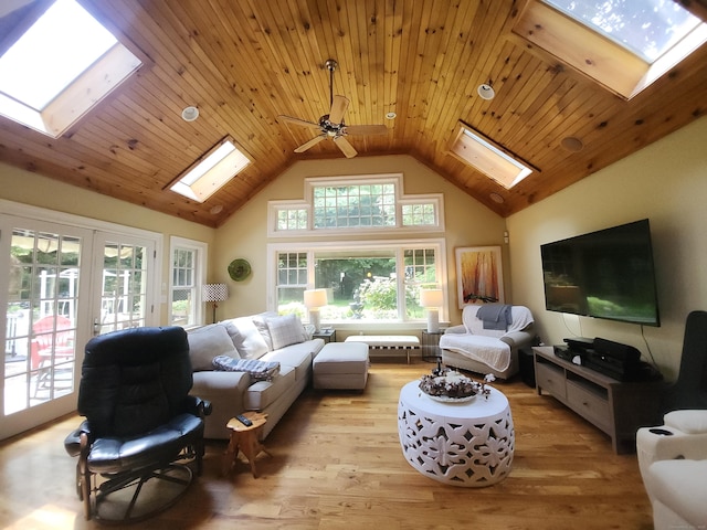 8 Caddy Rd, Norwalk, CT 06851 - living area with a skylight, high vaulted ceiling, light wood-style flooring, and ceiling fan
