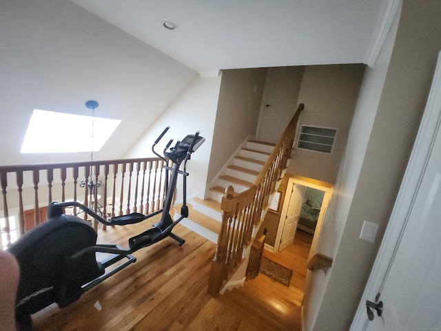 8 Caddy Rd, Norwalk, CT 06851 - stairway with wood finished floors and a skylight