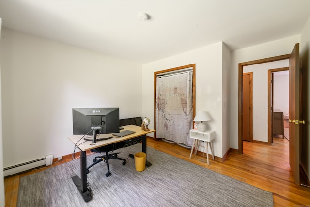 15 Revere Rd, Washington, CT 06793 - office space featuring a baseboard heating unit and wood finished floors